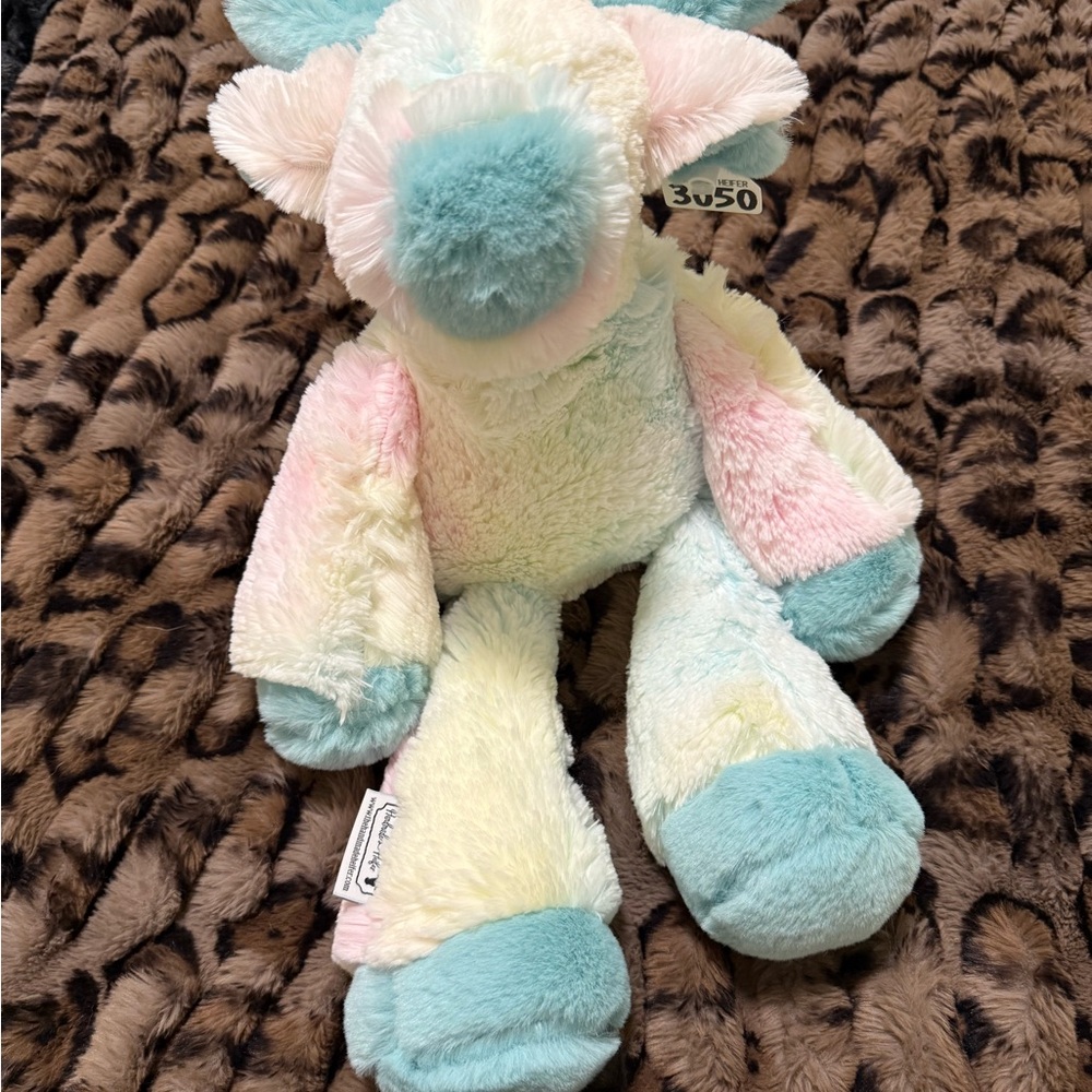 Blue and Pink Plush Stuffed Animal with Fluffy Detail
